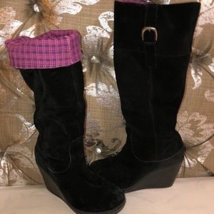 Black worn leather wedge boots